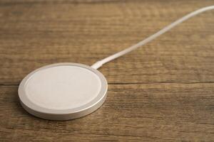 Wireless charger, magnetic charging modern equipment of mobile phone. photo