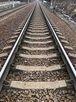 direct railway track going into the distance, high-speed railway photo