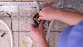 Close-up of electrician working on circuitry video