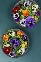Fresh salad with flowers. photo