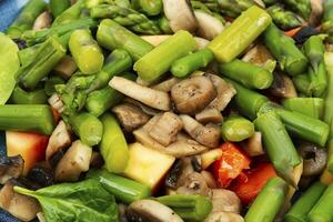 Vegan green asparagus and mushroom salad. photo