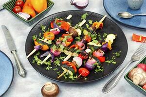 Grilled vegetables on skewers, kebabs. photo