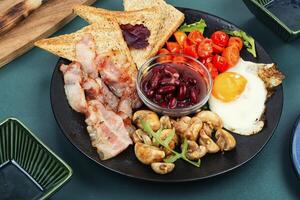 Full English breakfast on a plate. photo