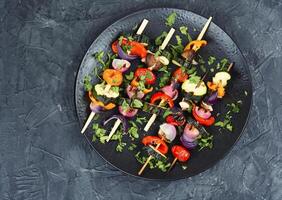 Grilled vegetables on skewers, BBQ. photo