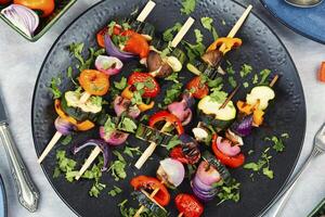 Grilled vegetables on skewers, kebabs. photo