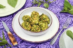 Diet cutlets made from fresh nettles. photo