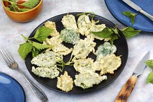 Breaded nettle or battered nettle, tempura. photo