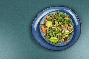 Vegan green asparagus and mushroom salad. photo