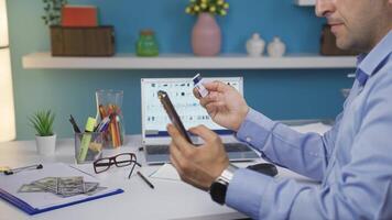 Man shopping for products on the phone with a credit card. video