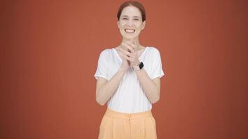 Woman clapping excitedly to camera. video