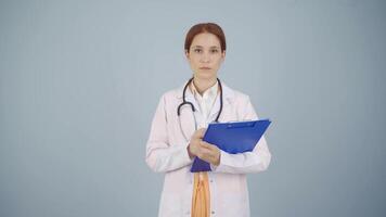 The doctor looks at the camera with a plain expression. video