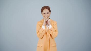 Business woman making cute gestures to the camera. video