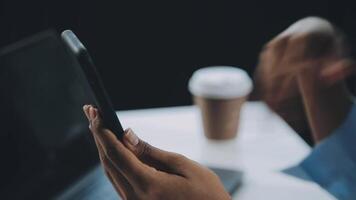 Asian woman holding smartphone, businesswoman using smartphone for social media and messaging with friends, using smartphone to send work email. Concepts of communication via the internet. video