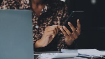 Asian woman holding smartphone, businesswoman using smartphone for social media and messaging with friends, using smartphone to send work email. Concepts of communication via the internet. video