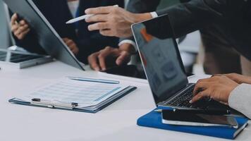Finance manager meeting discussing company growth project success financial statistics, professional investor working start up project for strategy plan with document, laptop and digital tablet. video