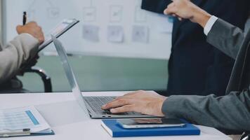Finance manager meeting discussing company growth project success financial statistics, professional investor working start up project for strategy plan with document, laptop and digital tablet. video