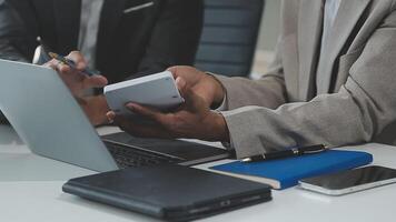 Finance manager meeting discussing company growth project success financial statistics, professional investor working start up project for strategy plan with document, laptop and digital tablet. video