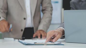 Finance manager meeting discussing company growth project success financial statistics, professional investor working start up project for strategy plan with document, laptop and digital tablet. video