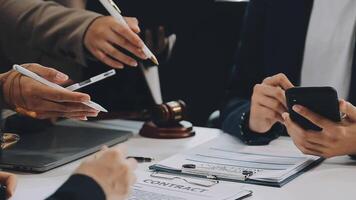 Professional male lawyer or counselor discussing negotiation legal case with client meeting with document contract in office, law and justice, attorney, lawsuit concept. video