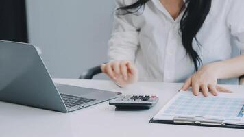 Young architect work project. Photo woman working with new startup project in modern loft. Generic design notebook on wood table. Horizontal, film effect video