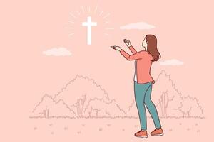 Catholic woman looks at cross glowing in sky, praying to god for help in finding right path vector