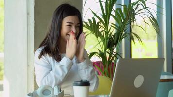 Excited business woman checking email reading great news on laptop. Amazed female professional winner feeling happy receiving new job opportunity, celebrates financial market growth concept video