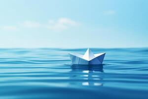 White paper boat on the dark blue sea water. Concept for World Ocean Day. photo