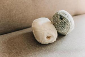 Skeins of woolen yarn for hand knitting. Concept for handmade. photo