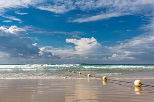 Mediterranean beach with yellow buoys in Tel Aviv, Israel. photo