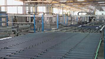 Conveyor belt for production a window pane. Industrial equipment video