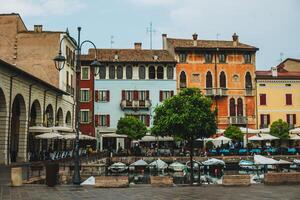 Amazing view of Desenzano del Garda in a sunny day. Travel destination in Italy. photo