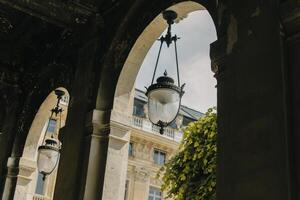 Beautiful lanterns with decor on the street of the old town of Paris, France. photo