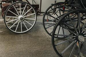 Carriage wheels on the street of Vienna, Austria. photo