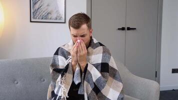 Sick day at home. A man has runny and common cold video