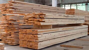 Fresh wooden slabs at the lumber storehouse. Lumber warehouse video