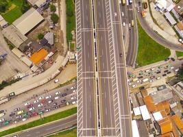 Bird eye view of Cileunyi Highway overpass, highway above the Cileunyi intersection, Bandung, West Java Indonesia, Asia. Transportation Industry. Above. Inter-city road access. Shot from a drone photo