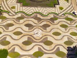 Top view beautiful wavy floor pattern in city park. Textured Background floor pattern. Aerial photography. Textured details. Shot from a flying drone photo