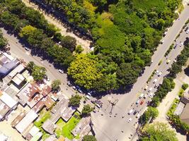 Aerial shot of city park with beautiful floor patterns and trees. Textured Background floor pattern. Aerial photography. Textured details. Shot from a flying drone photo