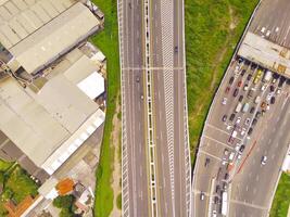 Bird eye view of Cileunyi Highway overpass, highway above the Cileunyi intersection, Bandung, West Java Indonesia, Asia. Transportation Industry. Above. Inter-city road access. Shot from a drone photo