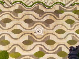 Top view beautiful wavy floor pattern in city park. Textured Background floor pattern. Aerial photography. Textured details. Shot from a flying drone photo