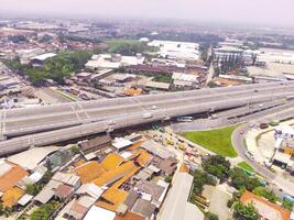 Bird eye view of Cileunyi Highway overpass, highway above the Cileunyi intersection, Bandung, West Java Indonesia, Asia. Transportation Industry. Above. Inter-city road access. Shot from a drone photo