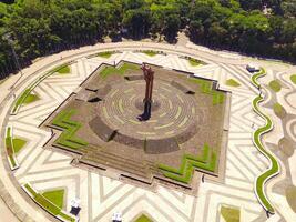 Bandung Sea of Fire Monument in Tegalega park, Bandung - Indonesia. Top view National monument, Indonesia, Asia. Aerial View. Drone Photography. Shot from a drone flying 100 meters high photo