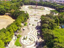 Aerial shot of city park with beautiful floor patterns and trees. Textured Background floor pattern. Aerial photography. Textured details. Shot from a flying drone photo