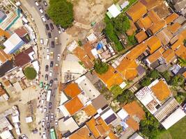 Congestion due to Eid homecoming traffic. Top view of traffic jam at road junction, Bandung - Indonesia. Transportation Industry. Above. Inter-city road access. Shot from a drone. photo