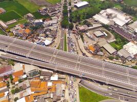 Bird eye view of Cileunyi Highway overpass, highway above the Cileunyi intersection, Bandung, West Java Indonesia, Asia. Transportation Industry. Above. Inter-city road access. Shot from a drone photo