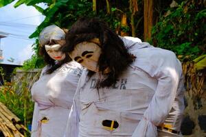 Travel Photography. The Beauty of Indonesian Culture. Closeup photo of Scarecrow doll on the side of the road. The scarecrow doll was made to commemorate Indonesia's independence day. Indonesia