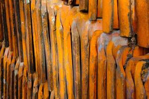 Background Photography. Textured Background. Photo of pile of used roof tiles. Close up photo of a pile of mossy roof tiles. Bandung - Indonesia, Asia