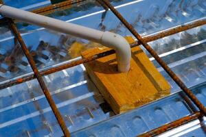 Industrial Photography. Construction Works. Installation of pipes inside wiremesh. Pipes are installed before floor casting. Bandung, Indonesia photo