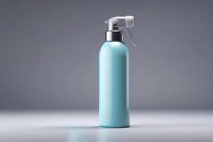 Minimalist Aqua Spray Bottle with Transparent Pump and Space for Branding on a Gray Backgroun photo