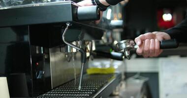 Closeup shot shows the process of making coffee by espresso machine. video